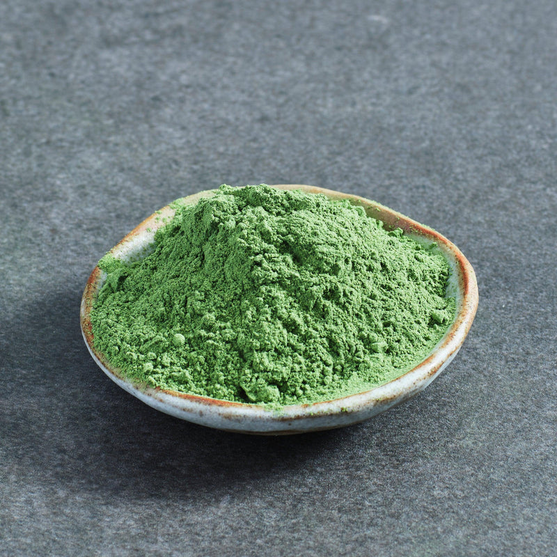 Organic Absolute Greens Powder in a bowl